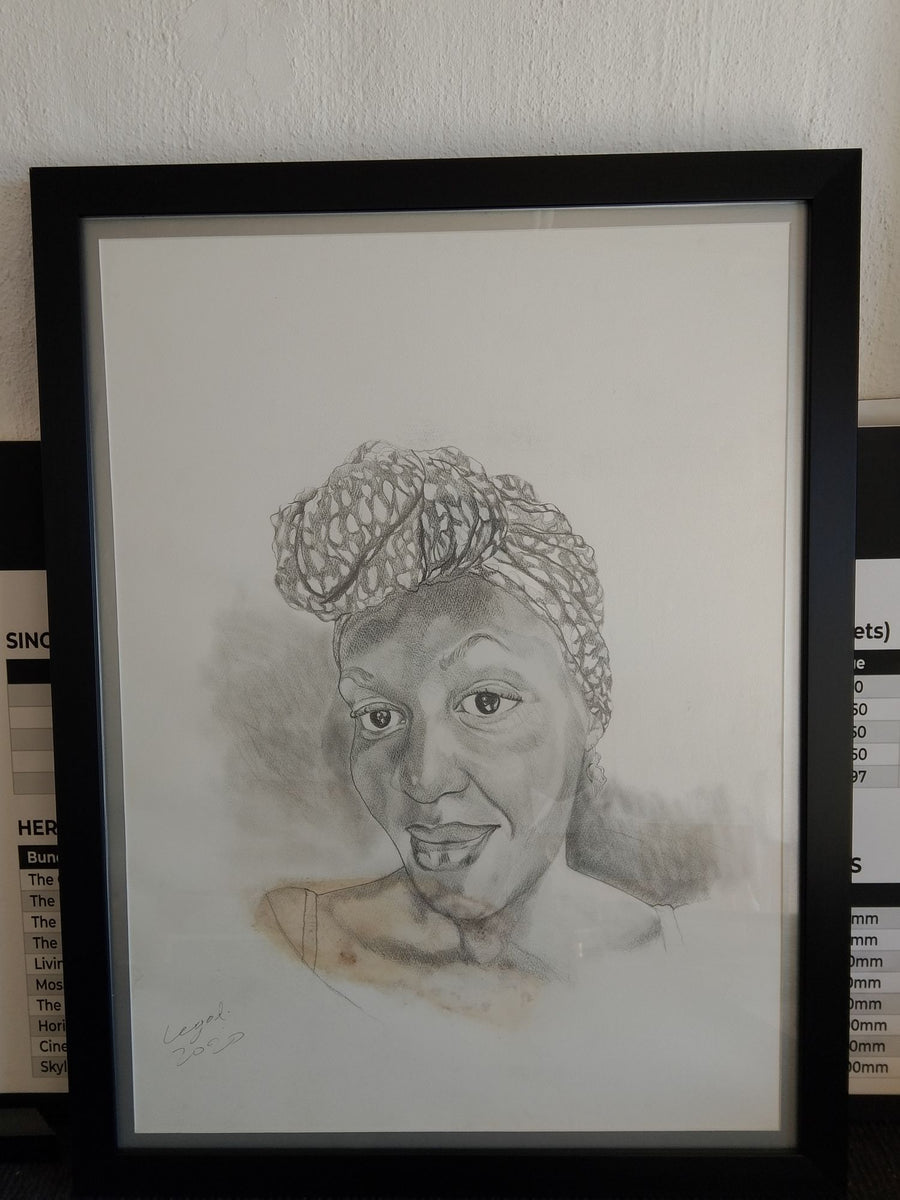 Framed pencil portrait