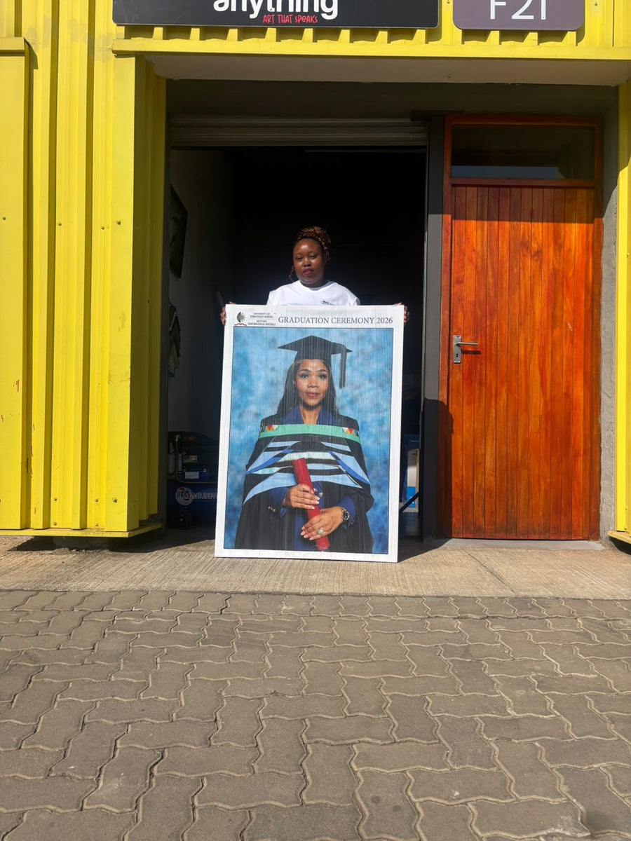 Graduation canvas at the studio door
