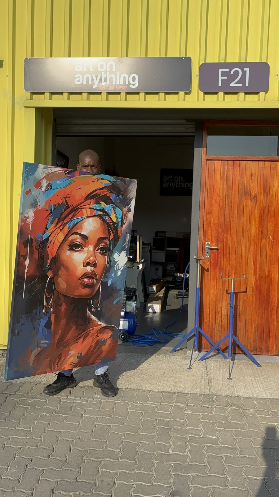 Large portrait canvas at our studio door