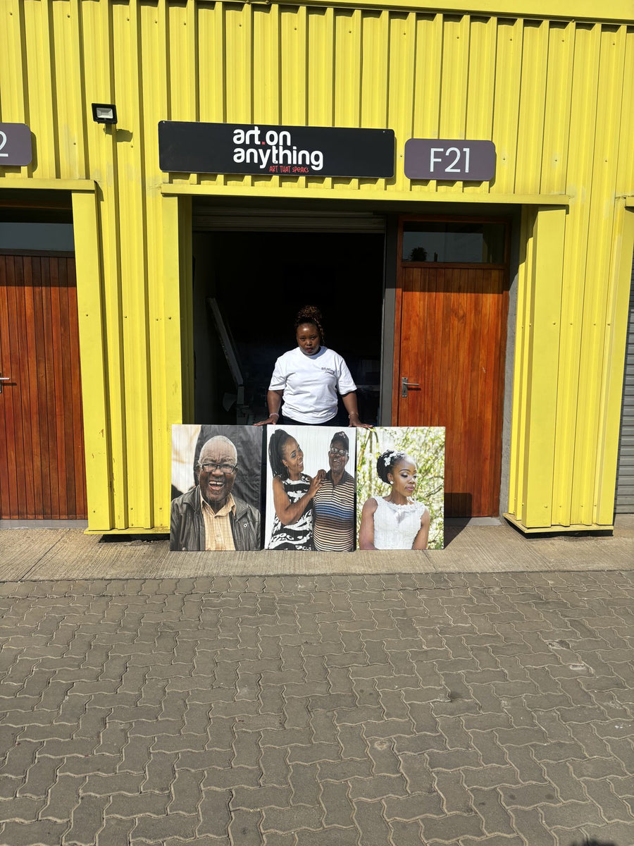 Set of portrait canvases at the studio door