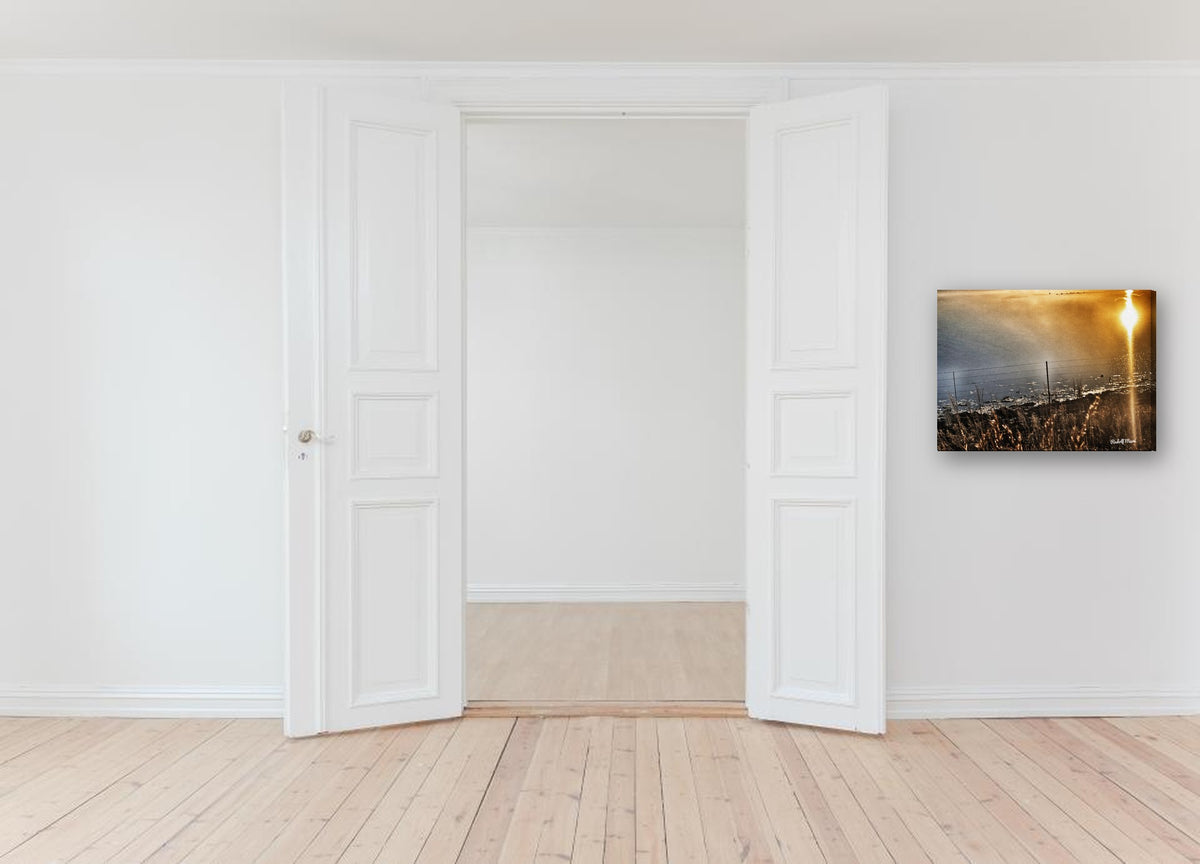 Golden Sunset Over the Water by Rudolf Maré canvas print in a hallway