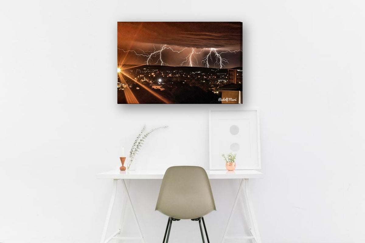 Lightning Over the Town by Rudolf Maré canvas print in a home office