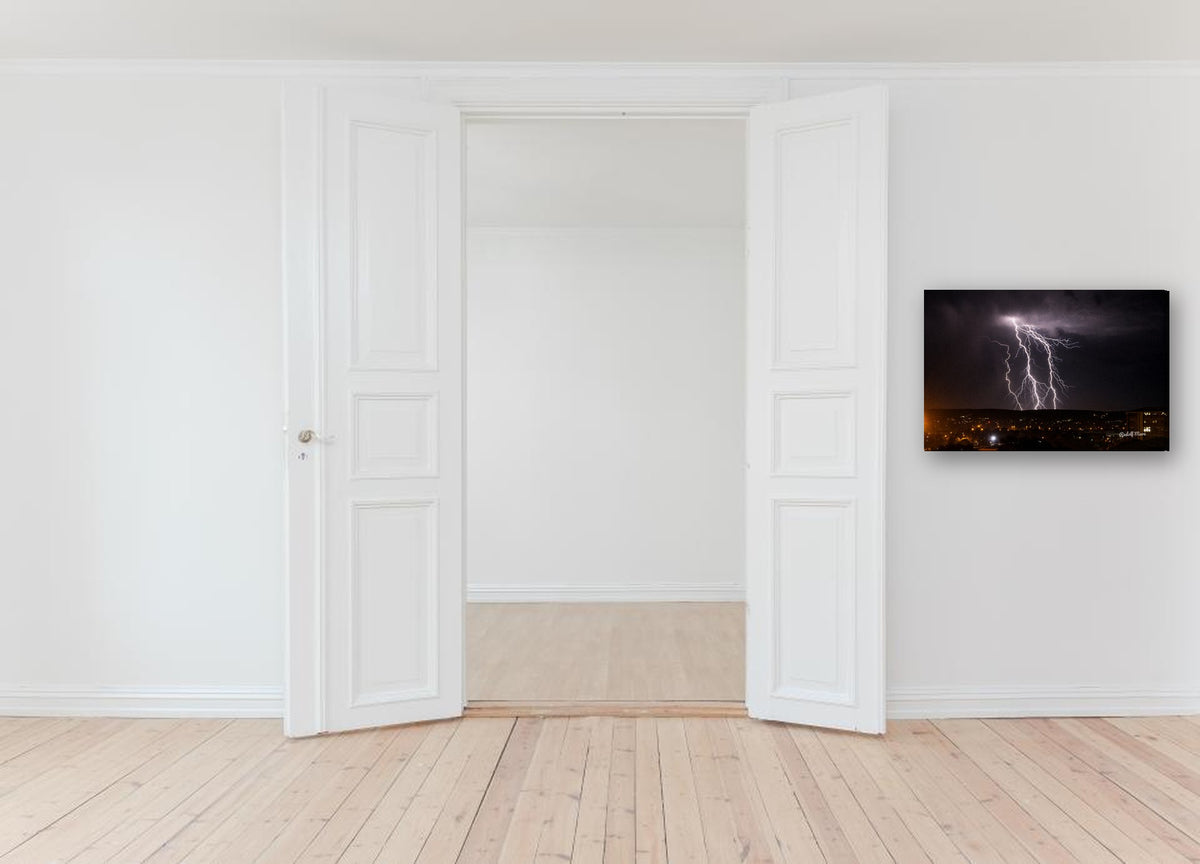 Lightning Strike at Night by Rudolf Maré canvas print in a hallway
