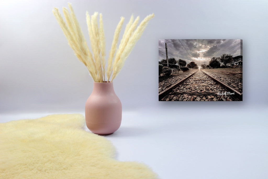 Railway Tracks Under Stormy Skies by Rudolf Maré canvas print in a styled corner