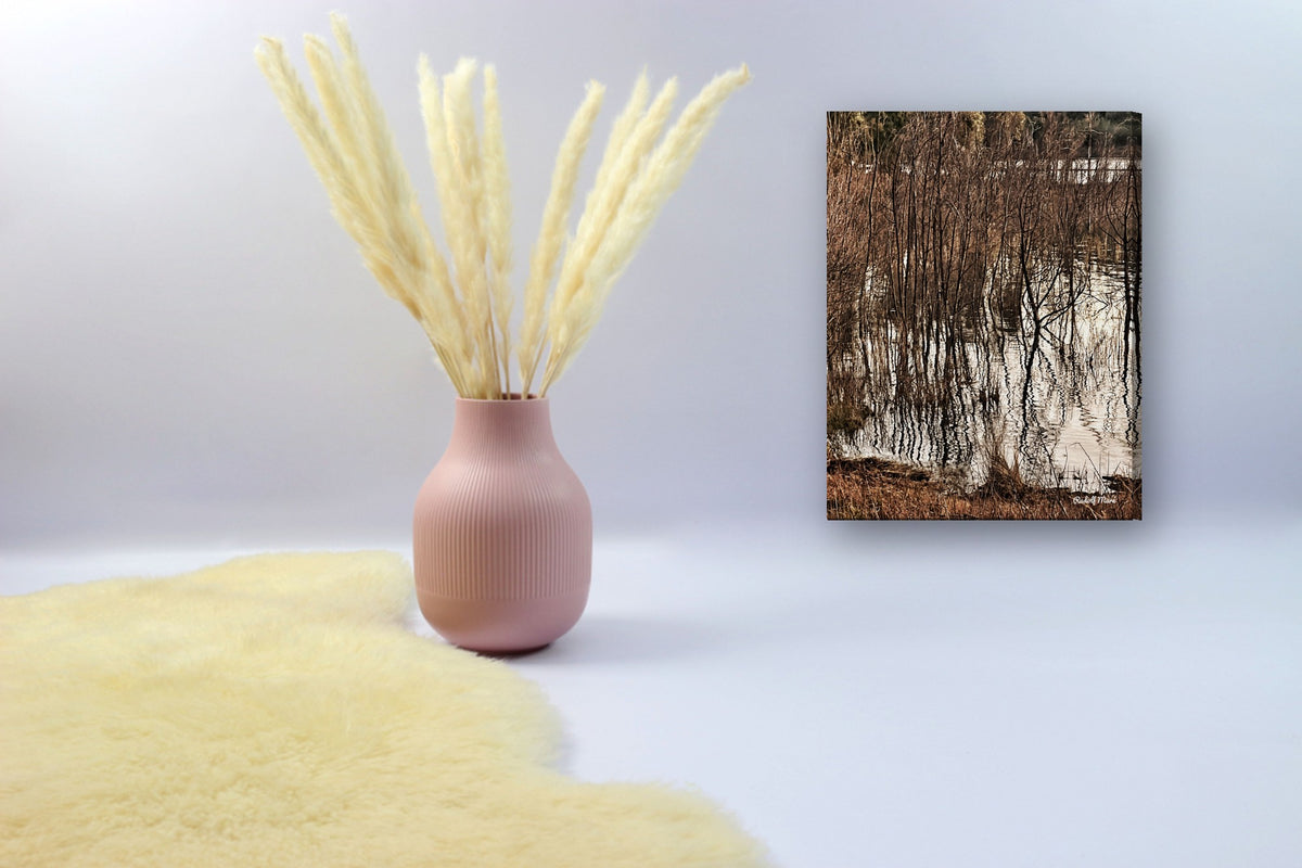Reeds Reflected in Water by Rudolf Maré canvas print in a styled corner