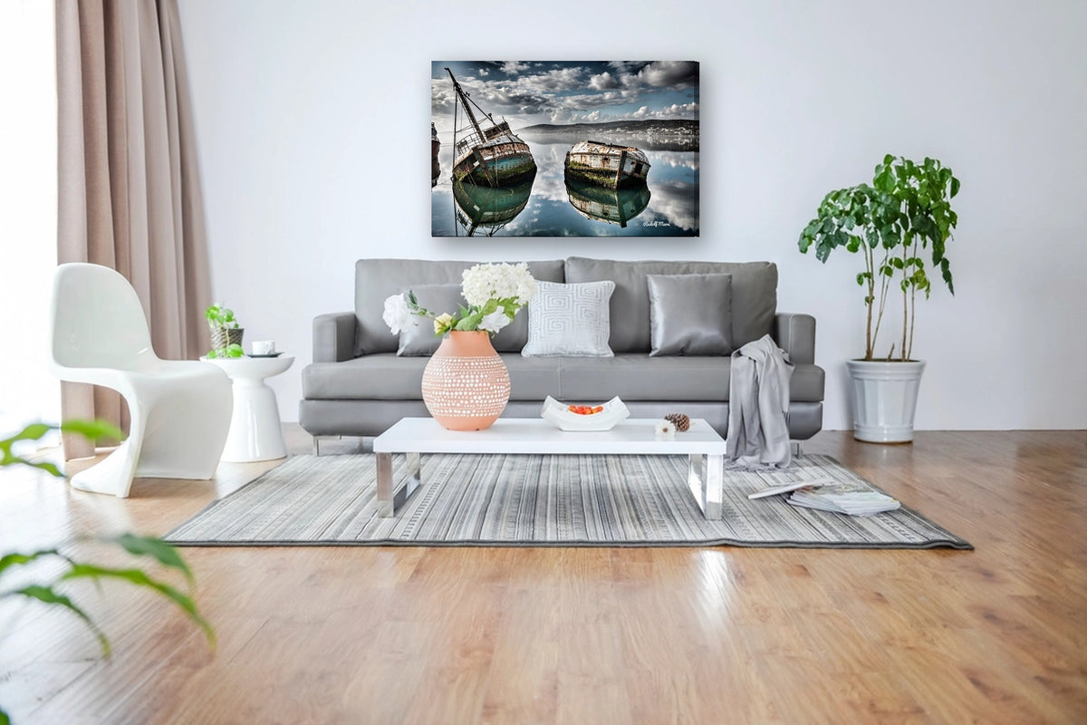 Shipwrecks in Still Water by Rudolf Maré canvas print in a living room