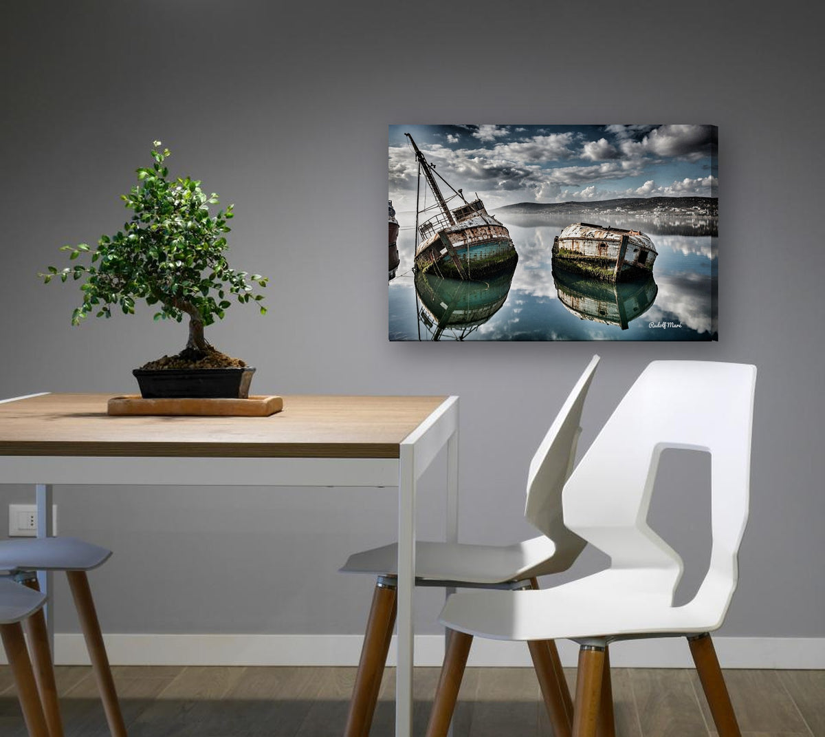 Shipwrecks in Still Water by Rudolf Maré canvas print in a dining nook