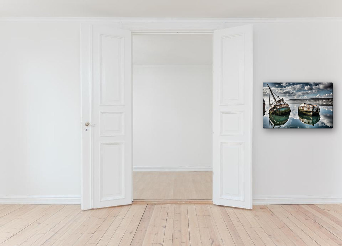 Shipwrecks in Still Water by Rudolf Maré canvas print in a hallway