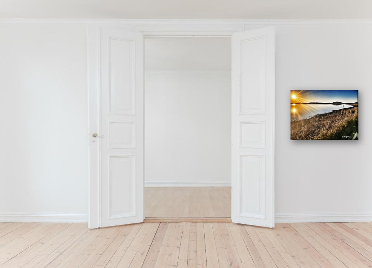 Sunset Over the Lake by Rudolf Maré canvas print in a hallway